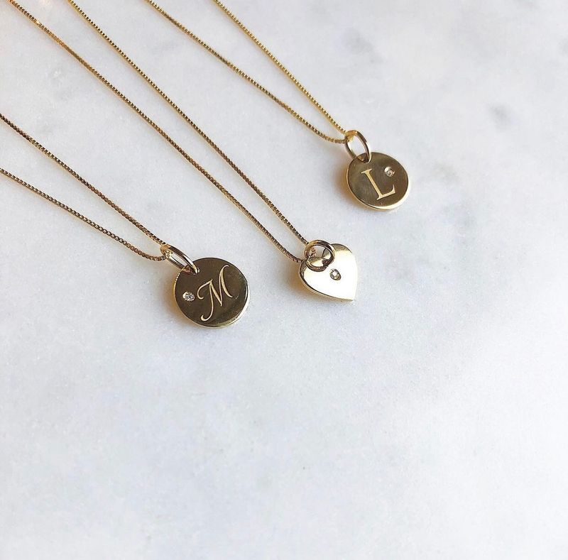 Pretty initial diamond pendant